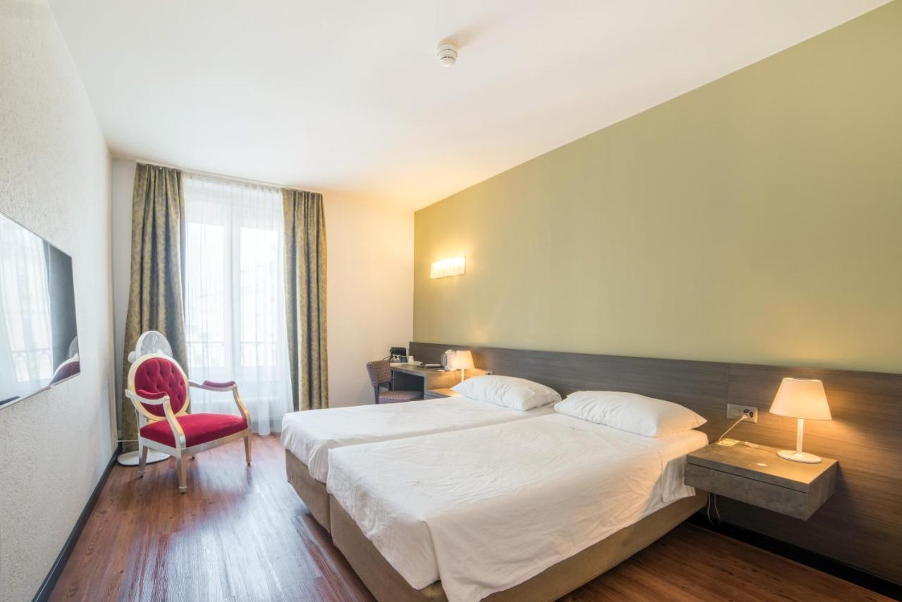 Hotel Montana Женева Номер фото